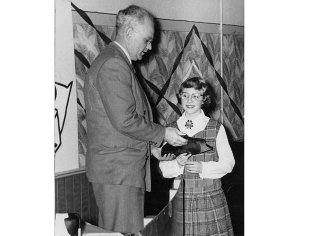 A 1960 photo of Al Remphrey awarding a plaque to unidentified young girl. For all we know, she may still be residing in Delta.