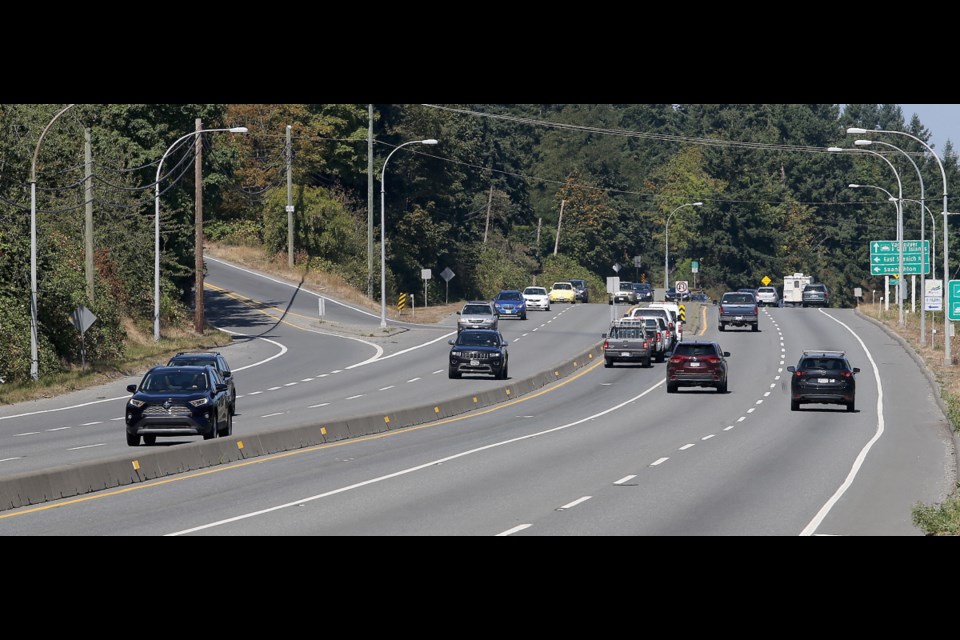 A flyover would send traffic from northbound Patricia Bay Highway to Keating Cross Road, going up the hill at left.