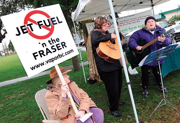 Members of VAPOR protest outside an open house hosted by VAFFC on Saturday. VAFFC - a consortium of airlines - wants to barge jet fuel up the south arm of the Fraser River and then pipe it through Richmond to YVR.