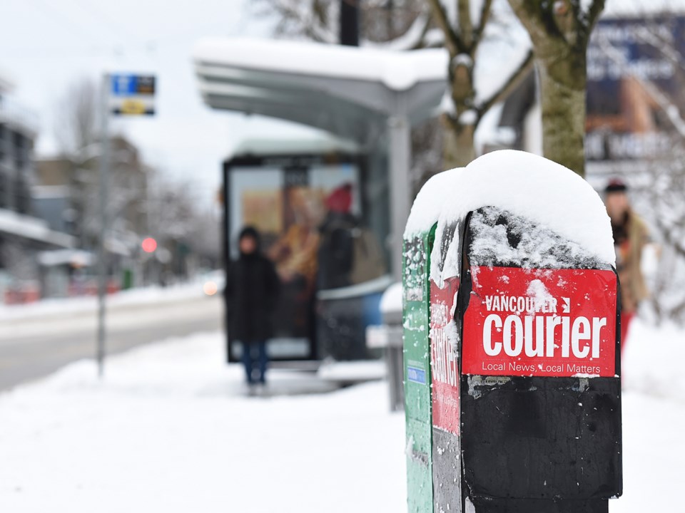 snowy newspaper box