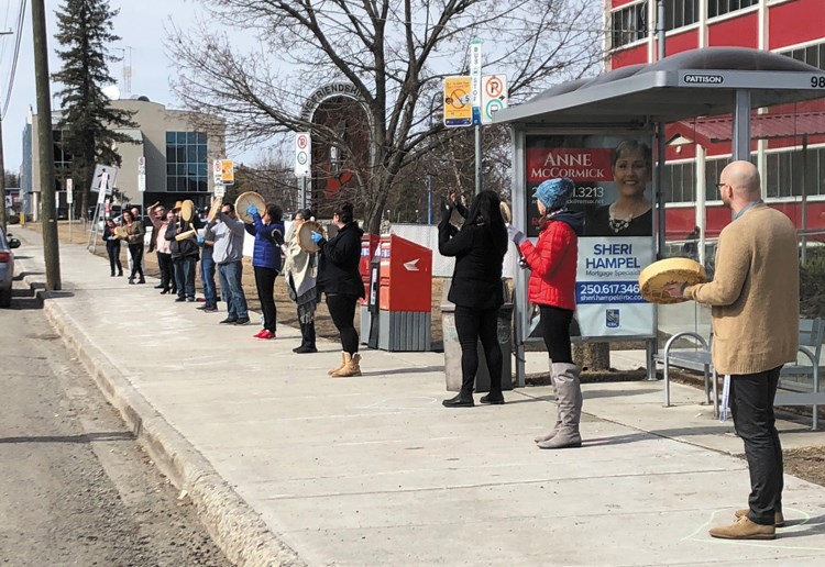 A group of drummers held a socially-distanced flash mob on Wednesday outside the Prince George Native Friendship Centre.