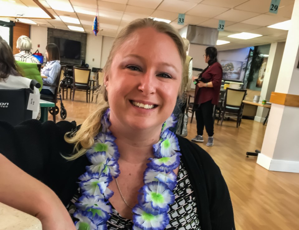 Theresa Postnikoff at a long-term care home in early March before the COVID-19 outbreak led to wides