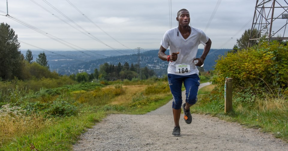 A contestant jogs to the top of the Coquitlam Crunch greenway during the 2019 Coquitlam Crunch Chall