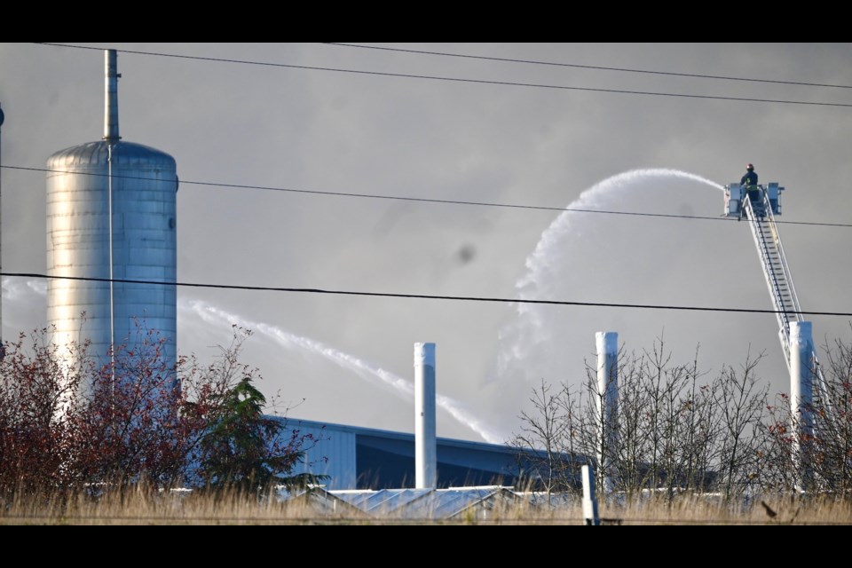 Delta firefighters are battling an extensive greenhouse/warehouse fire in East Delta Sunday morning.