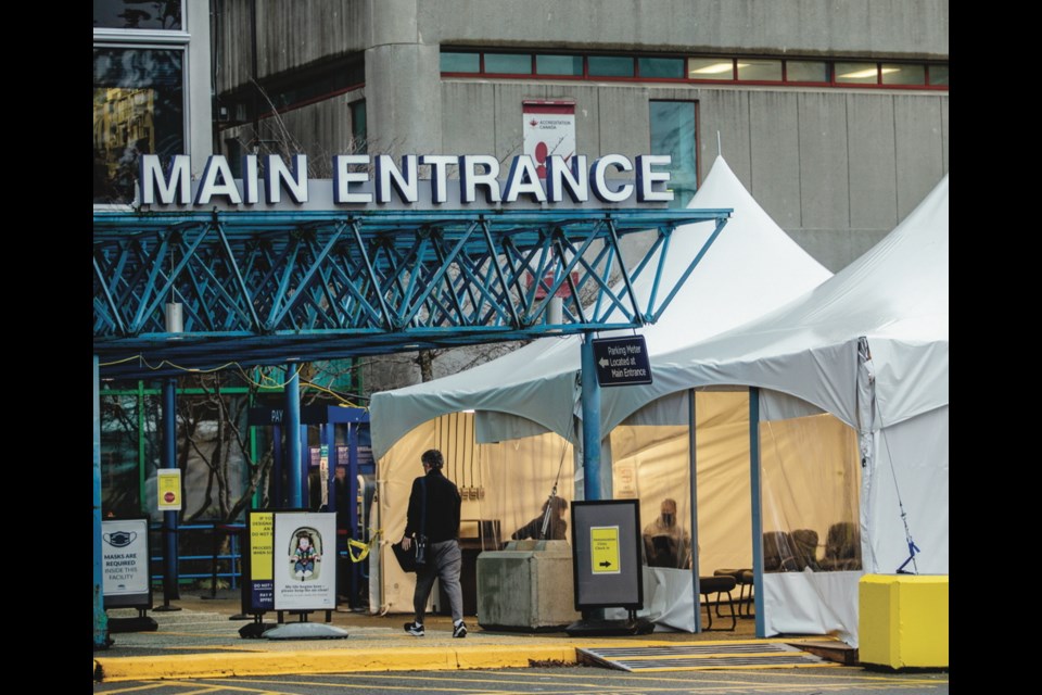 An immunization clinic at the main entrance to Victoria General ­Hospital. High-risk groups are a priority for receiving initial doses. Provincial health officer Dr. Bonnie Henry says new ­shipments of vaccine are expected by Thursday. DARREN STONE, TIMES COLONIST