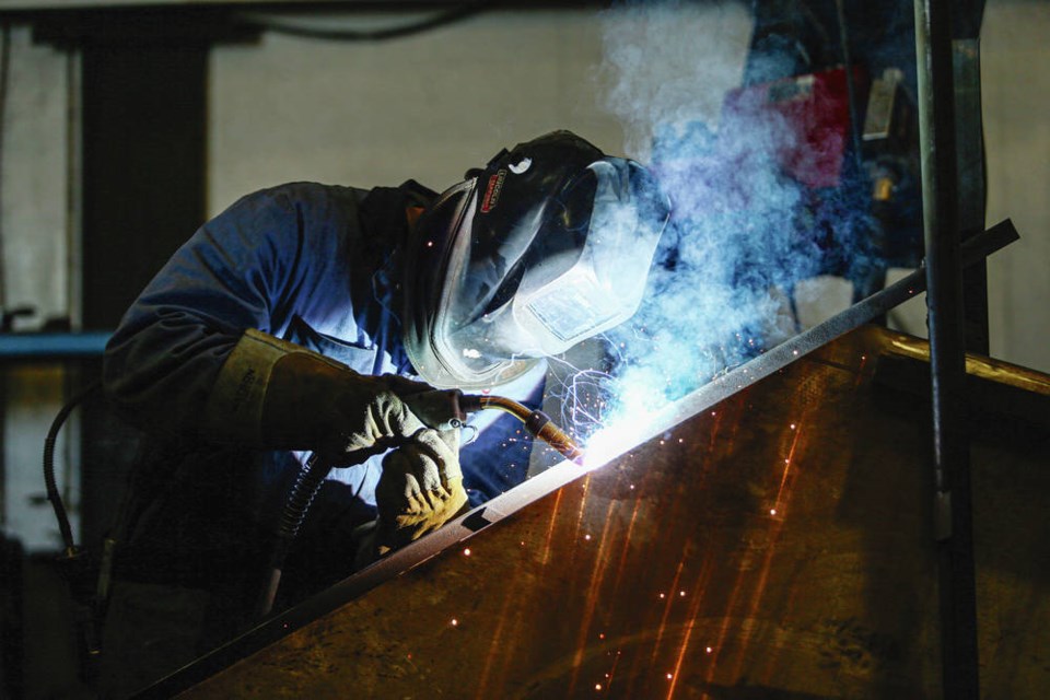 Jesse Sukut welds. ADRIAN LAM, TIMES COLONIST