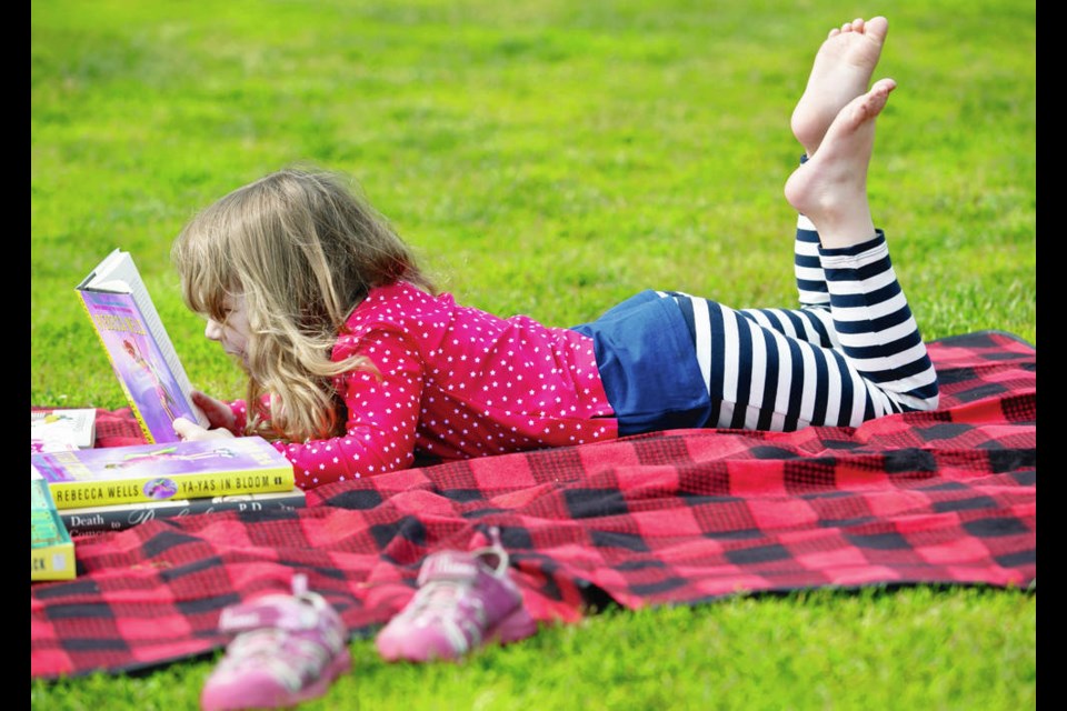 The Greater Victoria Public Library is offering a saʴý Summer Reading Club with prizes to encourage children to read for 20 minutes every day. DARREN STONE, TIMES COLONIST