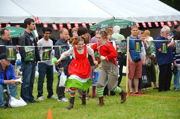 On the run: Mischievous Knotty Tail Trolls were part of the entertainment at last weekend's Scandinavian Midsummer Festival at Burnaby's Scandinavian Community Centre.