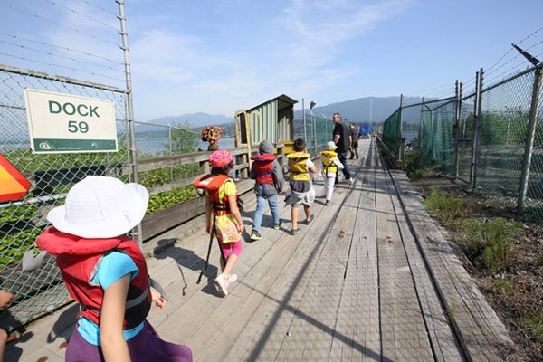 Kinder Morgan and students from Westridge Elementary released thousands of young chinook salmon by the company's Westridge Marine Terminal recently.