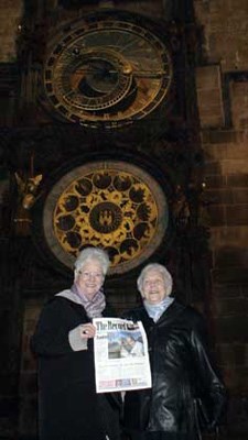 European tour: Quay residents Barbara Marks and June Burnham took their Record along when they travelled to Europe on a Danube riverboat cruise. Here, they're standing in front of the Analogical Clock in Wenceslas Square in Prague.