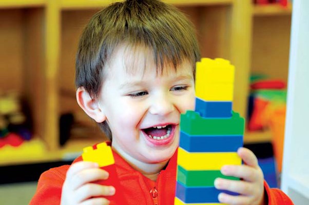 Fun with Lego: Ethan Conell enjoys creating with Lego at the New Westminster Family Place drop-in at Lord Kelvin Elementary School. It's Family Place's newest program in New Westminster.