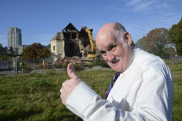 A great day: New Westminster resident Richard McDonald gives the thumbs up as the demolition of the Centre Block tower takes place. He lived at Woodlands for 10 years and was part of the group that organized the demolition ceremony.