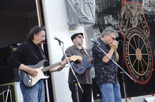 Blue Express, which includes former New Westminster MLA Chuck Puchmayr, right, played at the lower stage on 12th Street between Nanaimo Street and Sixth Avenue on Sunday afternoon during the 12th Street Music Festival.