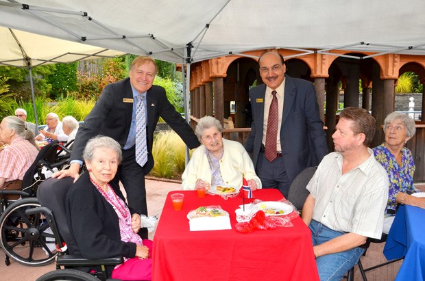 Local politicians Peter Julian and Raj Chouhan made an appearance at Normanna's 65th annual garden party, which also marked the 65th anniversary for the ladies' auxiliary.