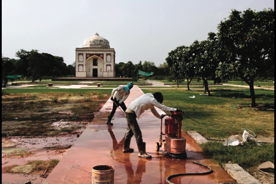 Labourers work on Sunder Nursery, a 40-hectare field founded by British colonists to grow experimental plants, in New Delhi, India.