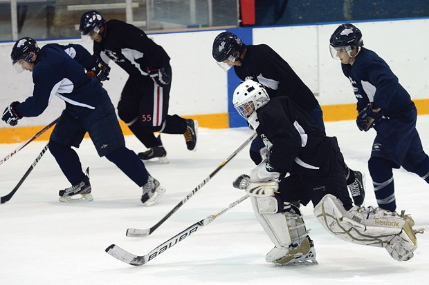 North Van Wolf Pack players grind out some end-of-practice laps during a training camp session Thursday at Harry Jerome Arena. The Wolf Pack will begin PJHL regular season play on Wednesday in Aldergrove before hosting Ridge Meadows in their home opener Sept. 14 at 7 p.m.