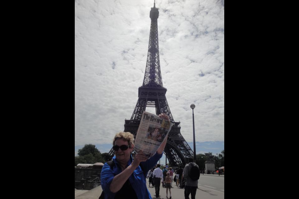 Edna Scheetz visited Paris, France, and took The Record to the Eiffel Tower.