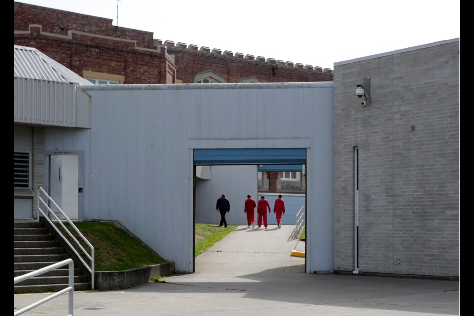 Inmates return to their cells at Vancouver Island Regional Correctional Center