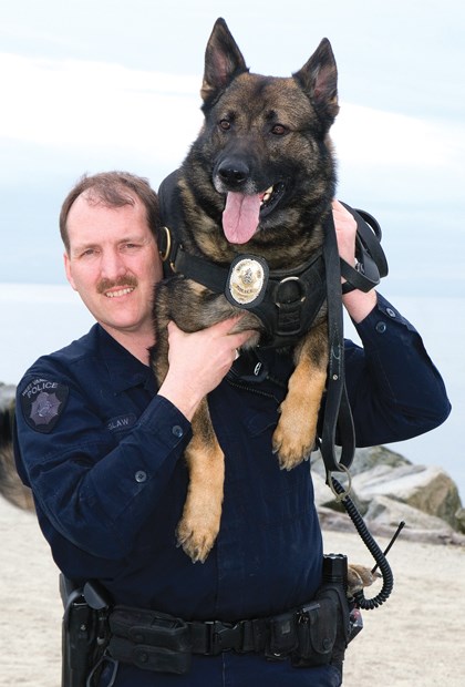 Const. Louis Beglaw and his police service dog Capone.