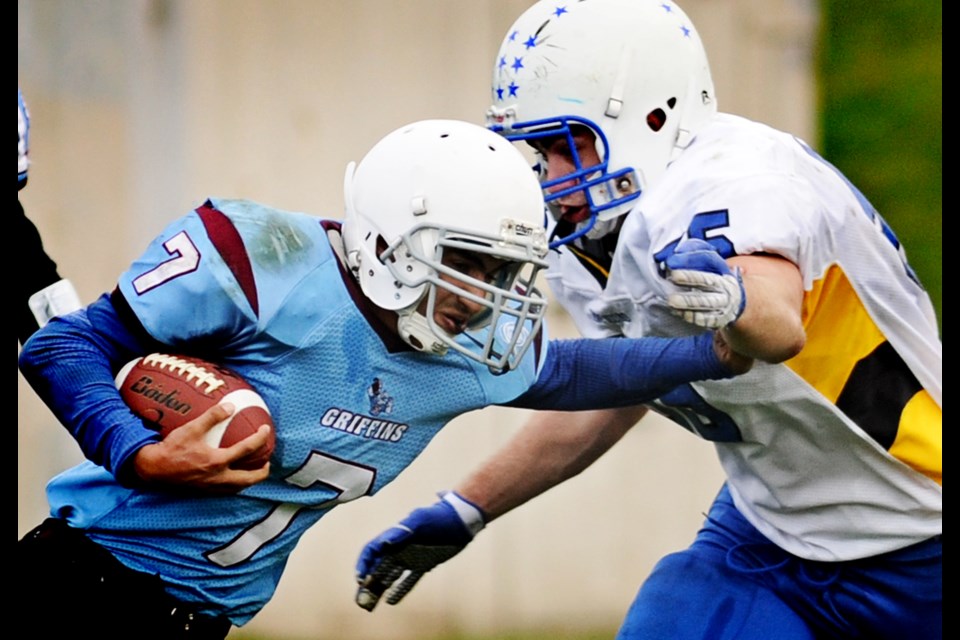 Eric Hamber Griffins running back Shahryer Khan pushed ahead in a 20-0 loss to Howe Sound Oct. 26.