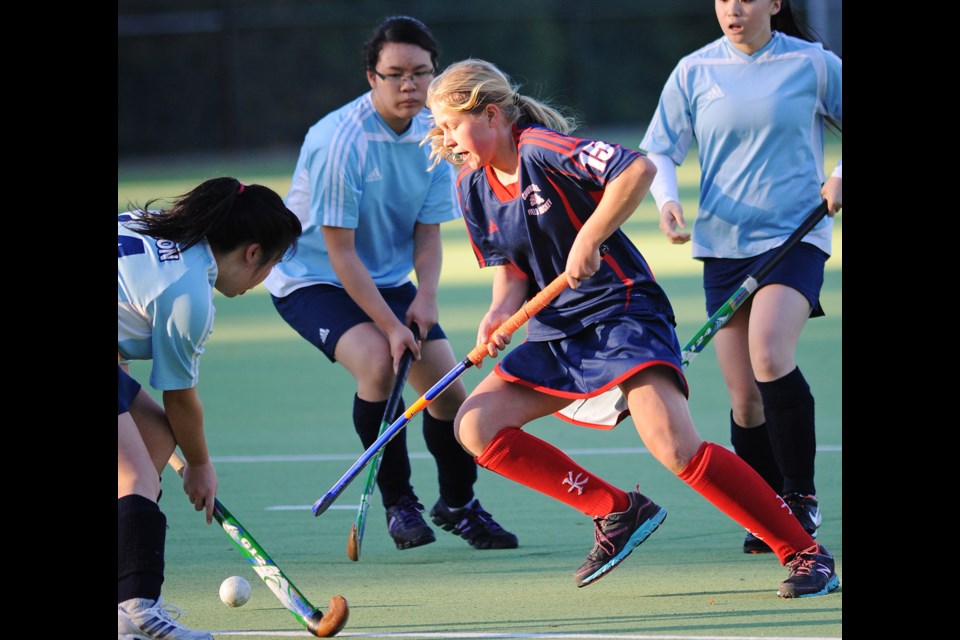 Thora Rae (No. 15) and the Churchill Bulldogs defeated the David Thompson Trojans 6-0 29 at Eric Hamber secondary to advance to the senior girls city championship.