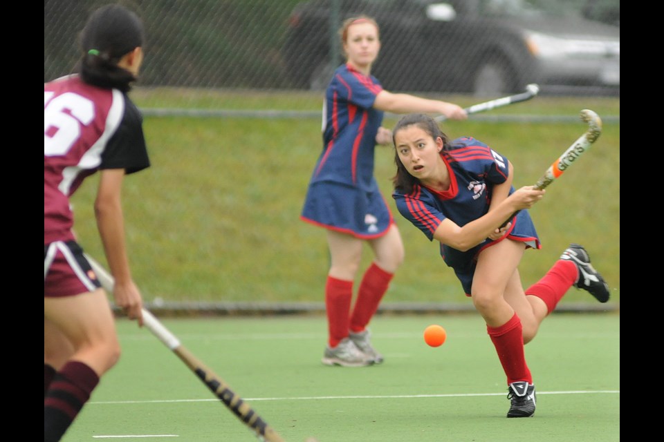 Churchill shooter Lee Marie Raytek (No. 17) fires the ball at net in the senior girls city championship Oct. 31 at Hamber.