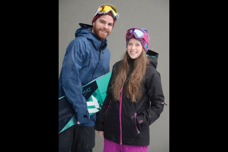 Dylan wears a Homeschool Disappearer jacket and cargo pants with a Bula Capital beanie, Scott LCG goggles and a Nitro T1 snowboard, while Lesley wears a Powder Room Casino jacket and Winner pants with a Bula Rachel toque and Scott Dana goggles — all available at Destination Ski in North Vancouver.