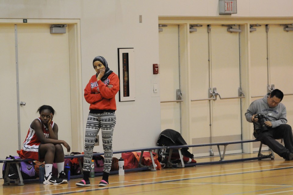 Junior girls basketball action at Crofton House secondary Thursday afternoon— with several members of the Brit team not playing it made for a very short bench for coach Sadia Ibrahim. Crofton House went on to win 39 – 21 to earn fourth place in the tourney standings. photo: Dan Toulgoet