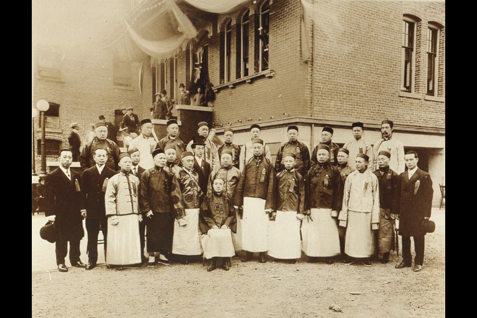 Staff, supporters and trustees of the Chinese Public School on opening day, Aug. 7, 1909