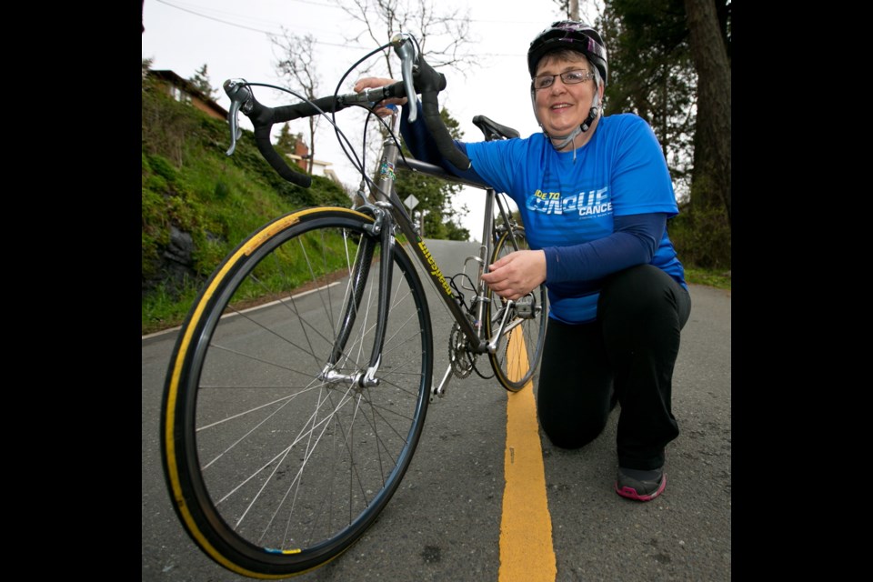 Saturday: Annette Halsted with her son Xavier Pelletier's bike. The 16-year-old boy died on a charity ride last year. Despite painful memories, she'll be on the Ride to Conquer Cancer this year.