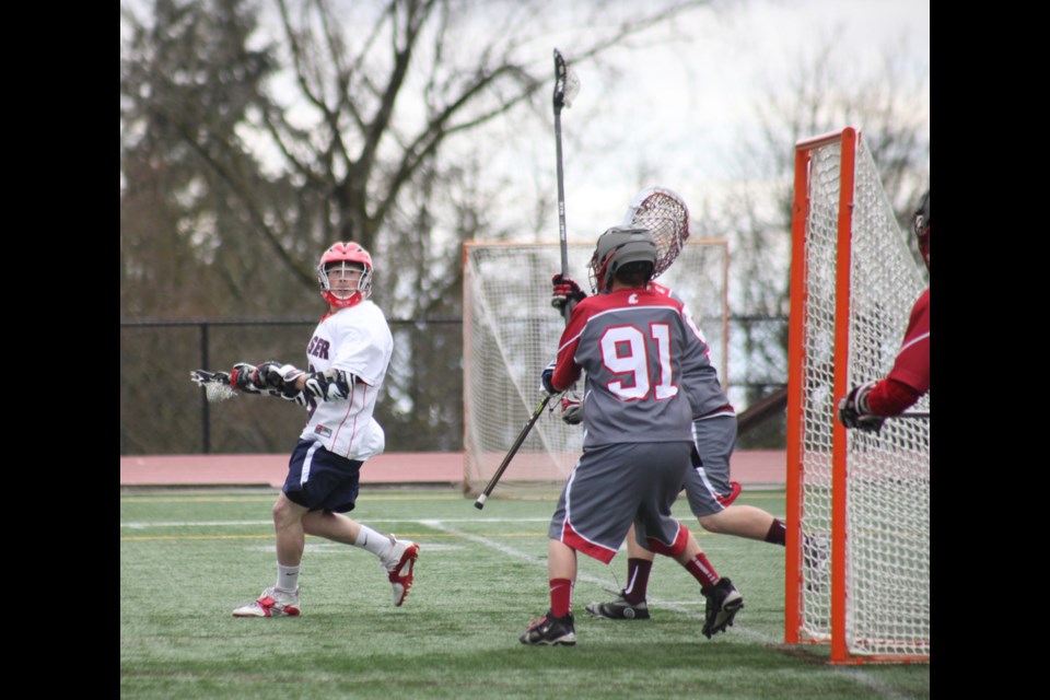 03-29-2014
(white) SFU vs. Washington state in Pacific Northwest field lacrosse league play at SFU.
photo Jason Lang