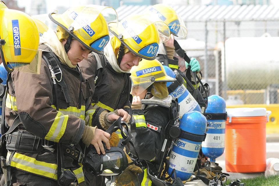 Twenty-four high school students wrapped up an intense week of firefighting boot camp at Vancouver Fire and Rescue Services’ training centre. Students attended a grueling five-day Youth Outreach Academy program where they acquired firefighting skills, first aid, search and rescue techniques and hands-on use of the “jaws of life.” Photos Dan Toulgoet