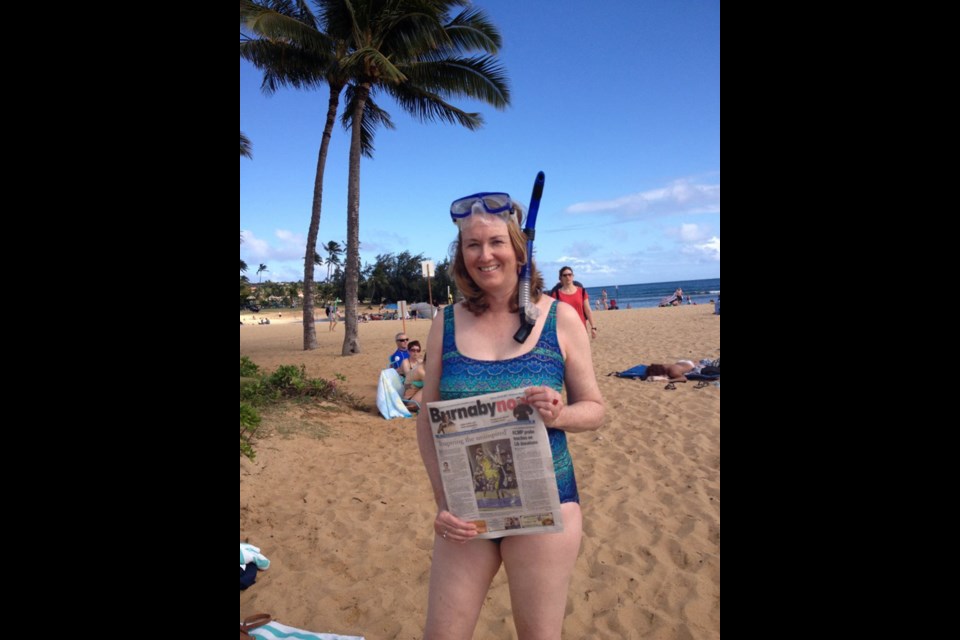 Karen Hammel took her hometown paper all the way to Hawaii.