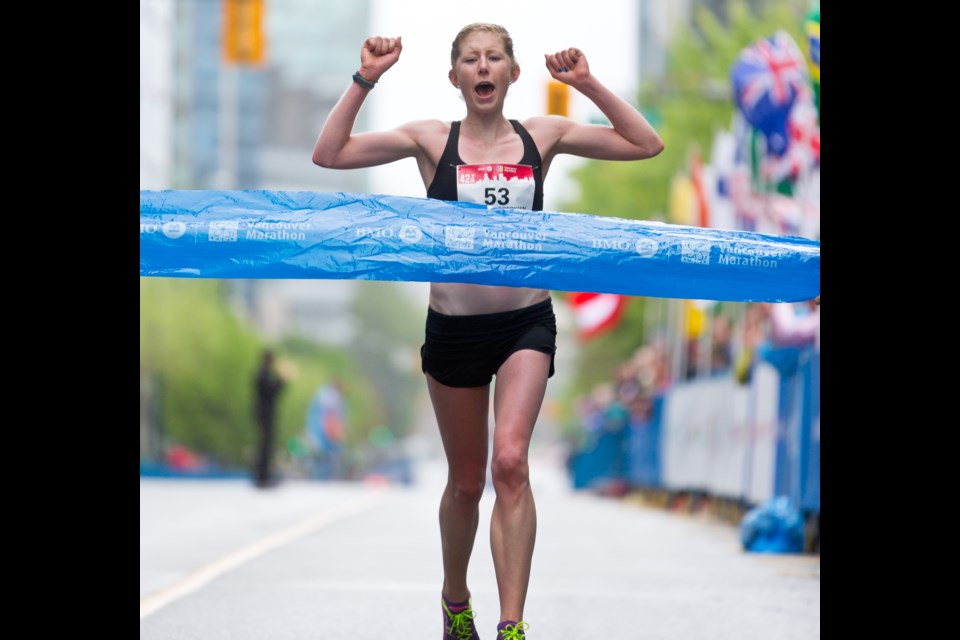 Kimberley Doerksen, a 鶹ýӳFalcons runner from Gibsons, wins the women's BMO 鶹ýӳMarathon on May 4, 2014.