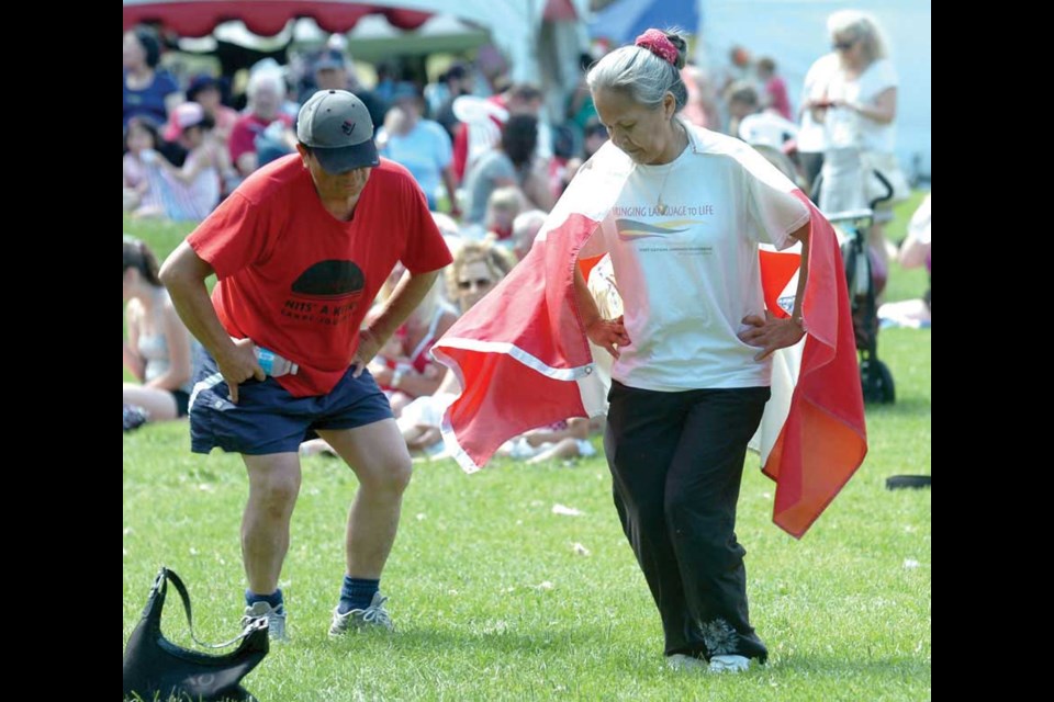 Ralph Alec, of the Cariboo Clan of the Lake Babine Nation, and Edie Frederick, of the Lheidli T'enneh band, enjoyed drumming at the opening ceremonies.