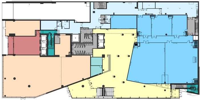 The ground floor of the Anvil Centre will feature the following spaces: conference space (dark blue), restaurant and coffee shop (peach), circulation areas (yellow), and kitchen space for conference support (light blue).