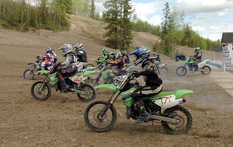 Racers launch off the new start gate at the Blackwater track.