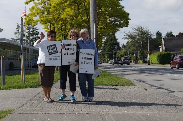 Teachers strike at McNair