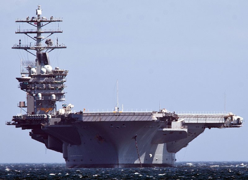 The USS Nimitz aircraft carrier arrives near the entrance to Esquimalt Harbour.