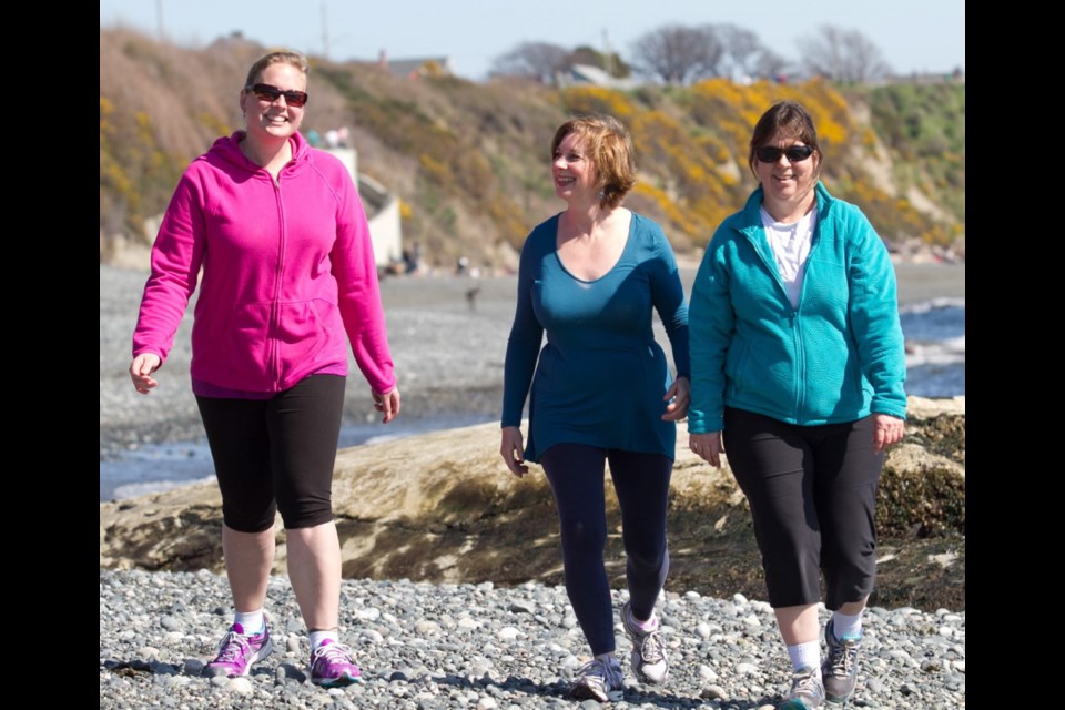 A stroll along the beach uncovers plenty of free workout opportunities for Raechel Gray, left, Elisabeth Westlake and Sandra McCulloch.