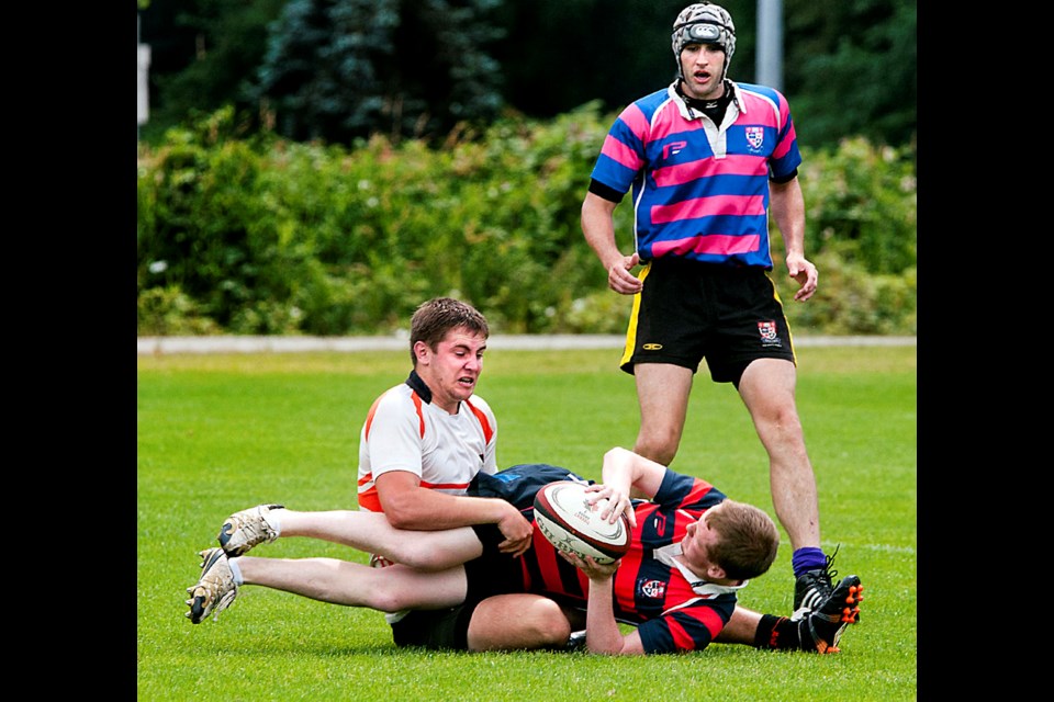 071214 - Burnaby, BC
Chung Chow photo
Rugby 7 Tournament at Burnaby Sports Fields.
Mens rugby
Meralomas (white) vs Simon Fraser University