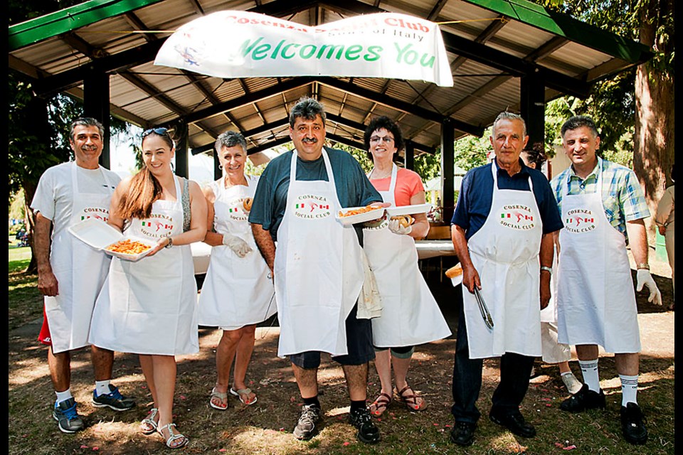 The Cosenza Club held its annual fundraising picnic at Confederation Park last Sunday. Frank Corrado, centre, and his crew cooked up hamburgers, hotdogs and traditional Italian fare like pasta.