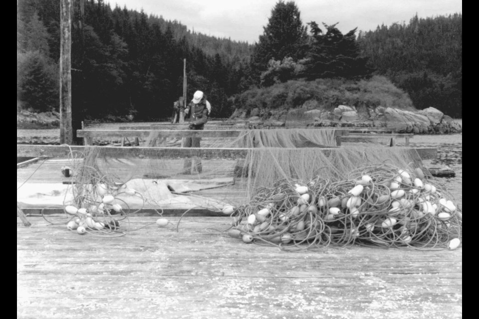 Author Nick Marach mending his nets in Johnstone Strait in the mid-1970s.