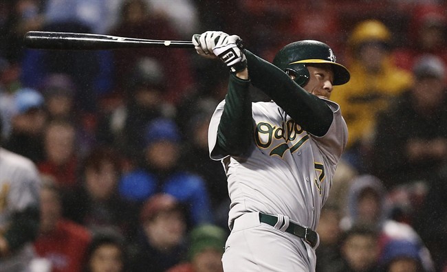 Colon, A's beat Red Sox 13-0 in rain-shortened game