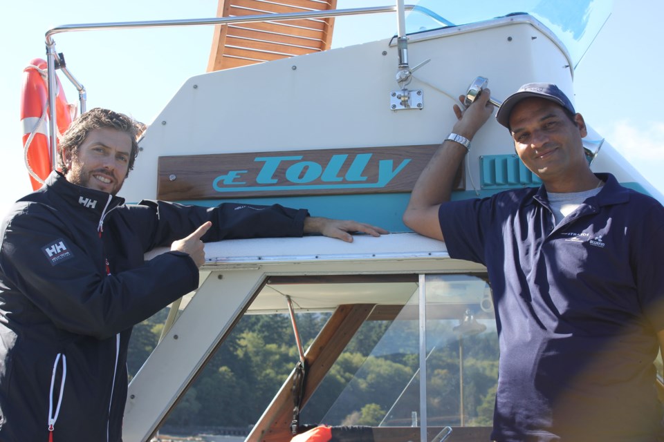 Bill Haley and Stan Taliadouroson their boat the E-Tolly.