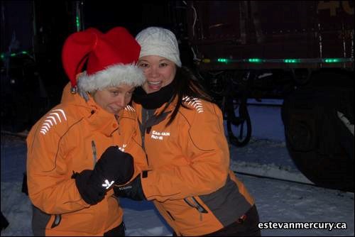 Some of the CP Rail workers enjoyed the music at the holiday train.