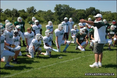 Regina Ram head coach Frank McCrystal talks to the young charges attending the Estevan minor football summer camp on Saturday