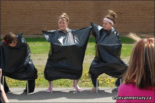 L-R:Brooklyn Mortenson, Kayla Grube and Ashley Chapman at Pleasantdale Pie Throw, raising money for Relay for Life.