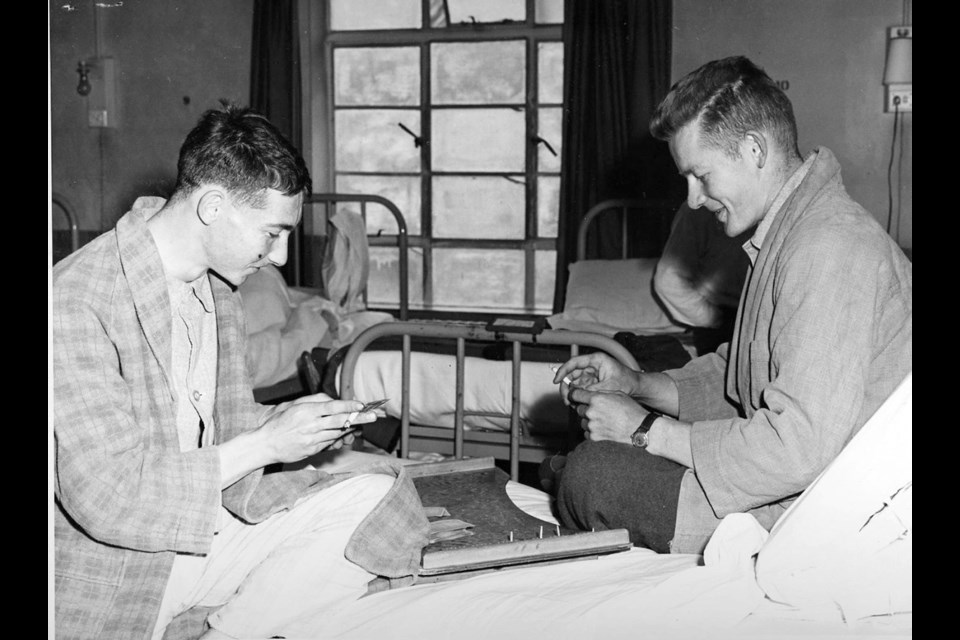 Ken Byron, left, and Roger Schjelderup of Courtenay recuperate in an English hospital after being wounded.