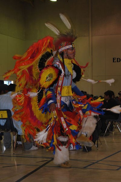 Following the Grand Entry, Ryan Ochapowace danced during the drumming. Ryan was the winner of the Teen Boys Fancy dance competition.